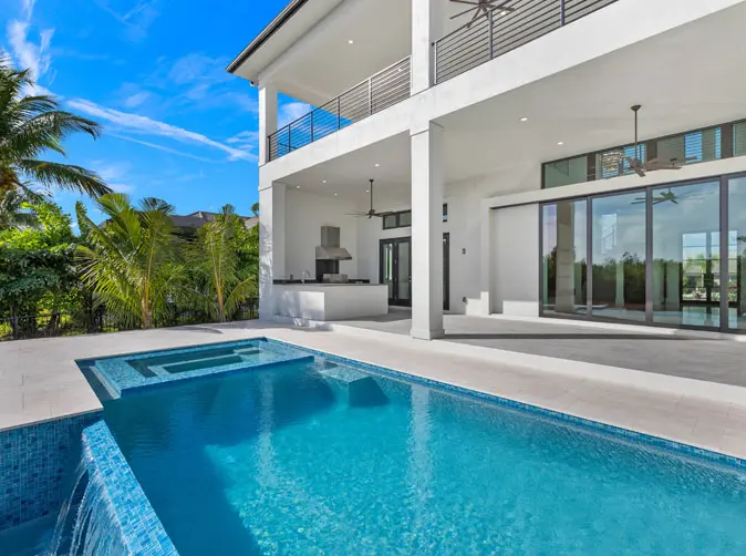 A pool that is in the middle of a house.